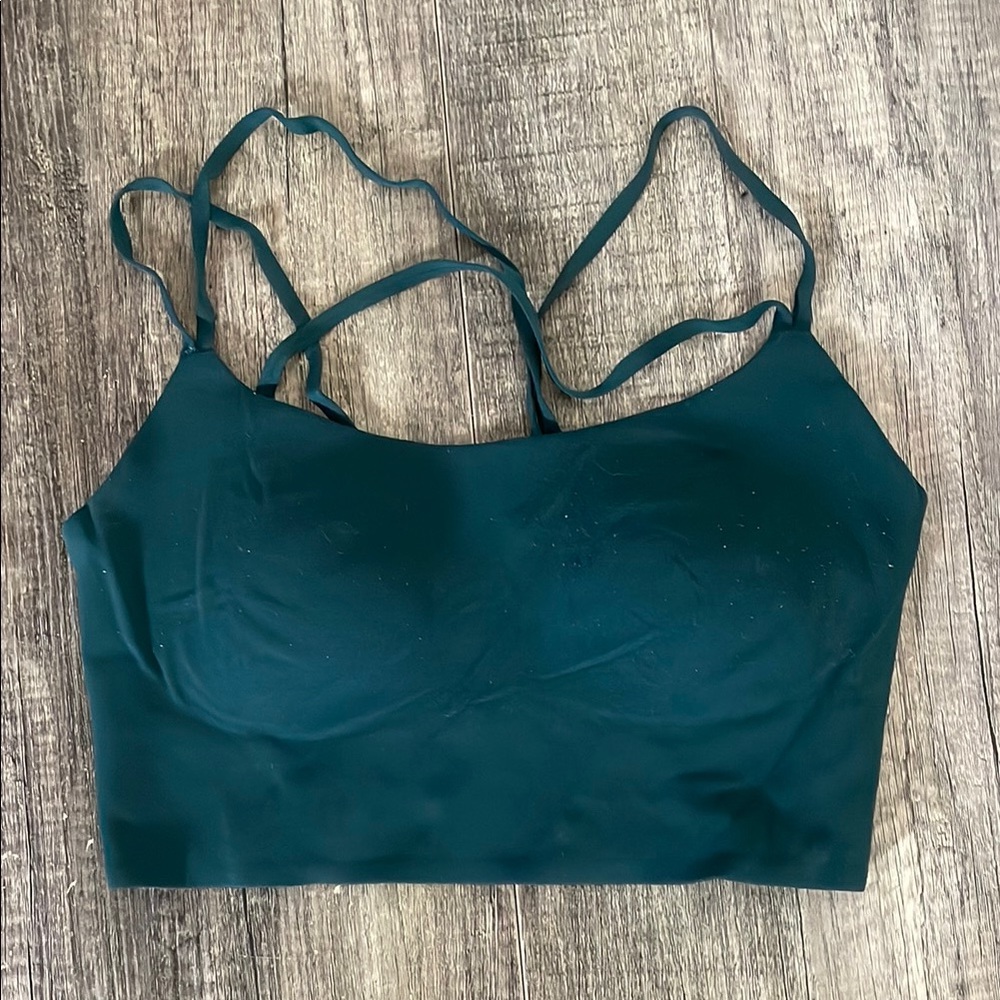 Teal Sports Bra with Stretchy Material and Cross-Back Design